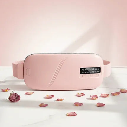 Bloom Warm wearable menstrual heating pad in blush pink on a white surface with rose petals, for drug-free period pain relief