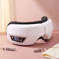 Bloom Warm™ Cordless Heated Eye Massager — Heat, Massage & Bluetooth — cordless heated eye massager with Bluetooth, air pressure headache and eye strain relief | Bloom Warm